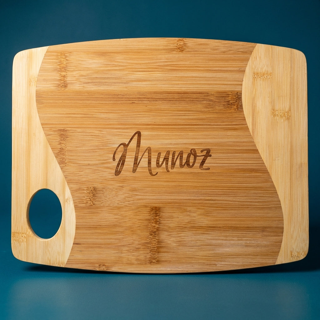 Custom laser engraved bamboo cutting board with name personalization example