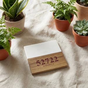 Marble and acacia wood drink coasters with custom laser engraving